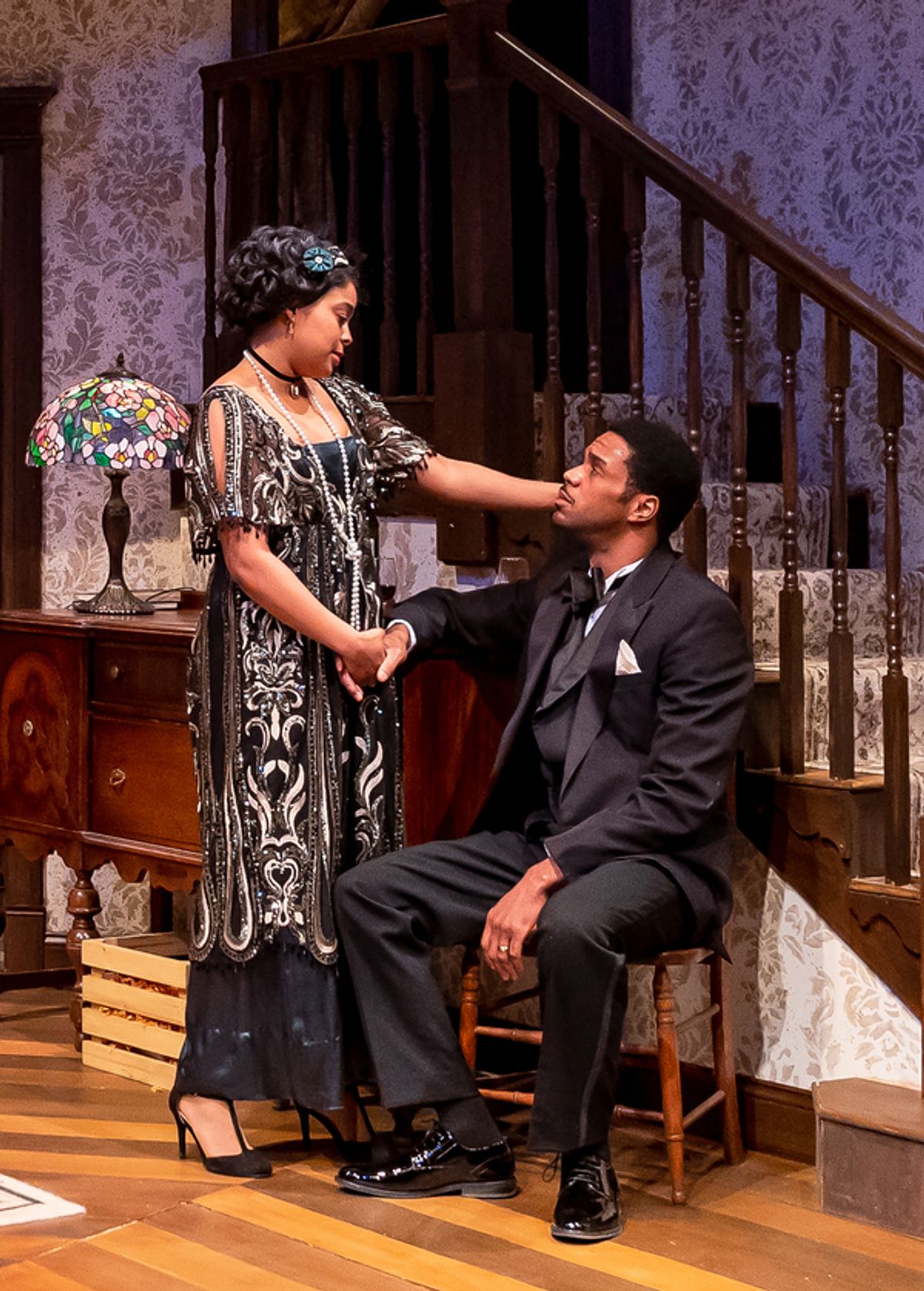 Annelle (Ayanna Bria Bakari, left) tries to comfort her husband Marcus (Travis Delgado).
 at 