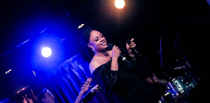 Review: With A ONE-WOMAN SHOWCIAL at The Green Room 42 Kaisha Huguley Modernizes The Art Form of Cabaret Image