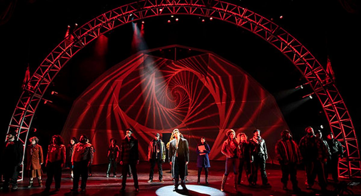 Alex Syiek (center) plays TV weatherman Phil Connors at 