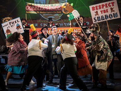 Alex Syiek (center) and the cast of Groundhog Day: The Musical  Photo