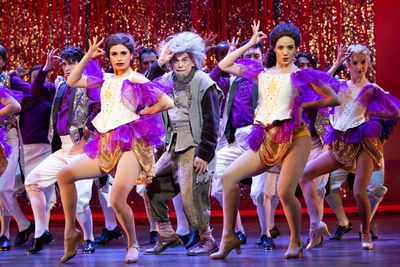 Randy Brenner (center) and the company of Something Rotten! Photo