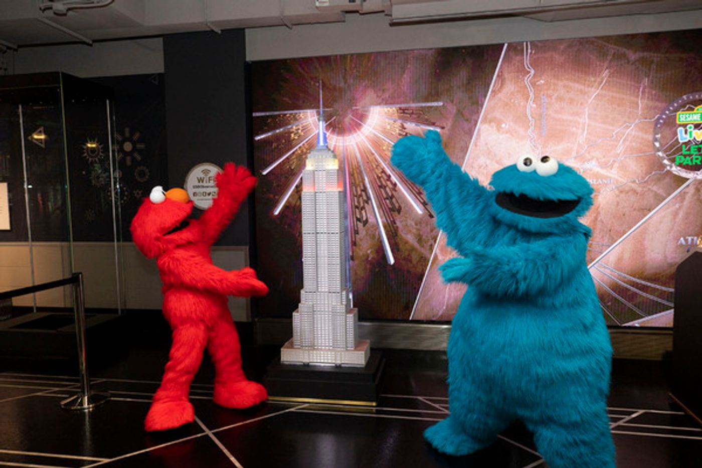Photos: The Empire State Building Celebrates SESAME STREET LIVE! with Elmo and Cookie Monster Photos: The Empire State Building Celebrates SESAME STREET LIVE! with Elmo and Cookie Monster Image
