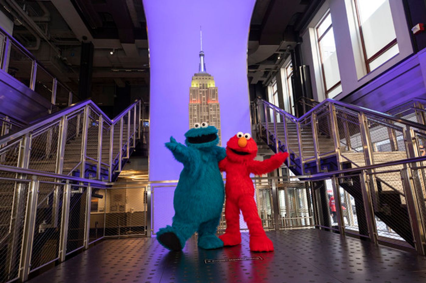 Photos: The Empire State Building Celebrates SESAME STREET LIVE! with Elmo and Cookie Monster Photos: The Empire State Building Celebrates SESAME STREET LIVE! with Elmo and Cookie Monster Image