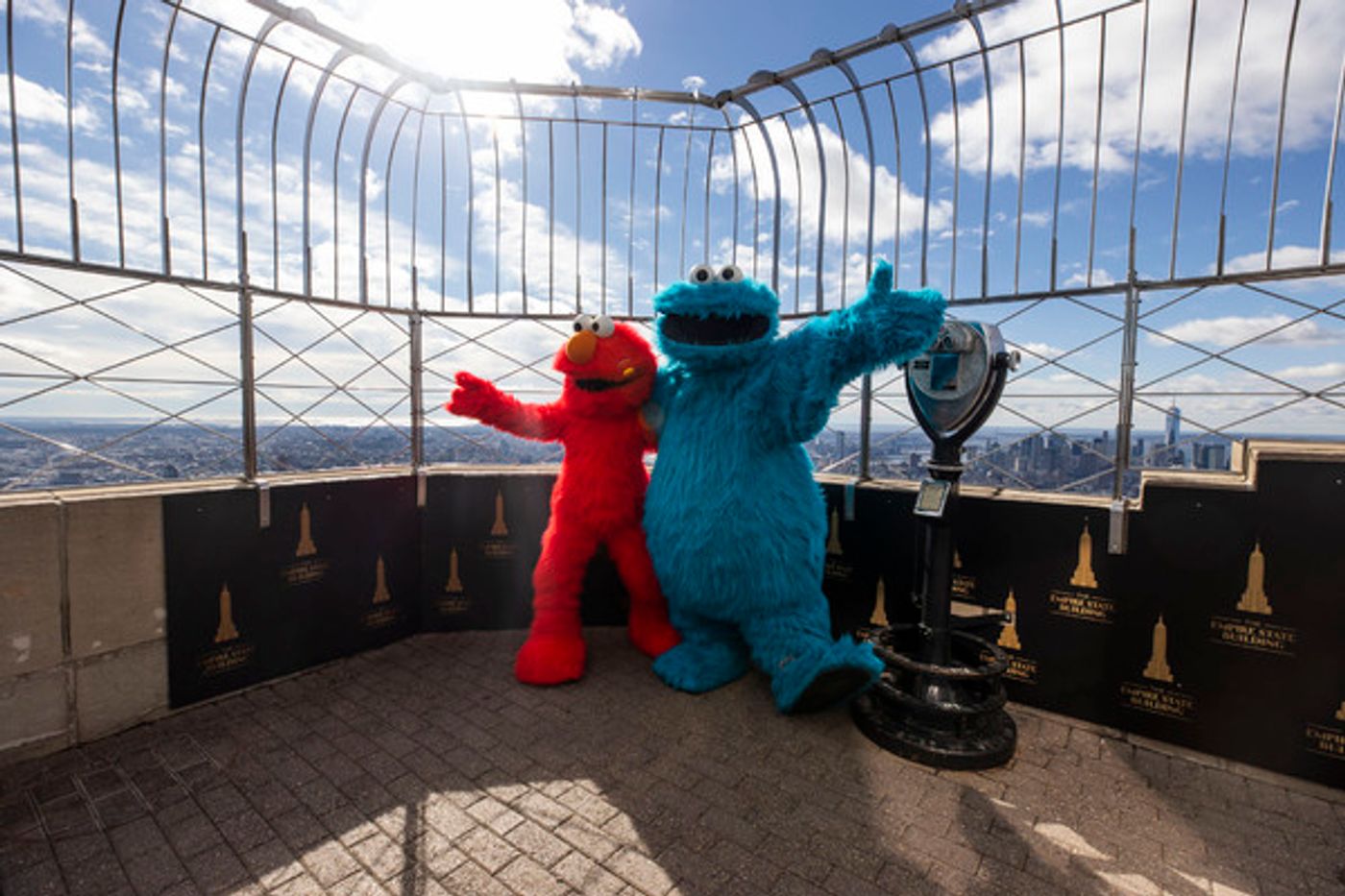Photos: The Empire State Building Celebrates SESAME STREET LIVE! with Elmo and Cookie Monster Photos: The Empire State Building Celebrates SESAME STREET LIVE! with Elmo and Cookie Monster Image