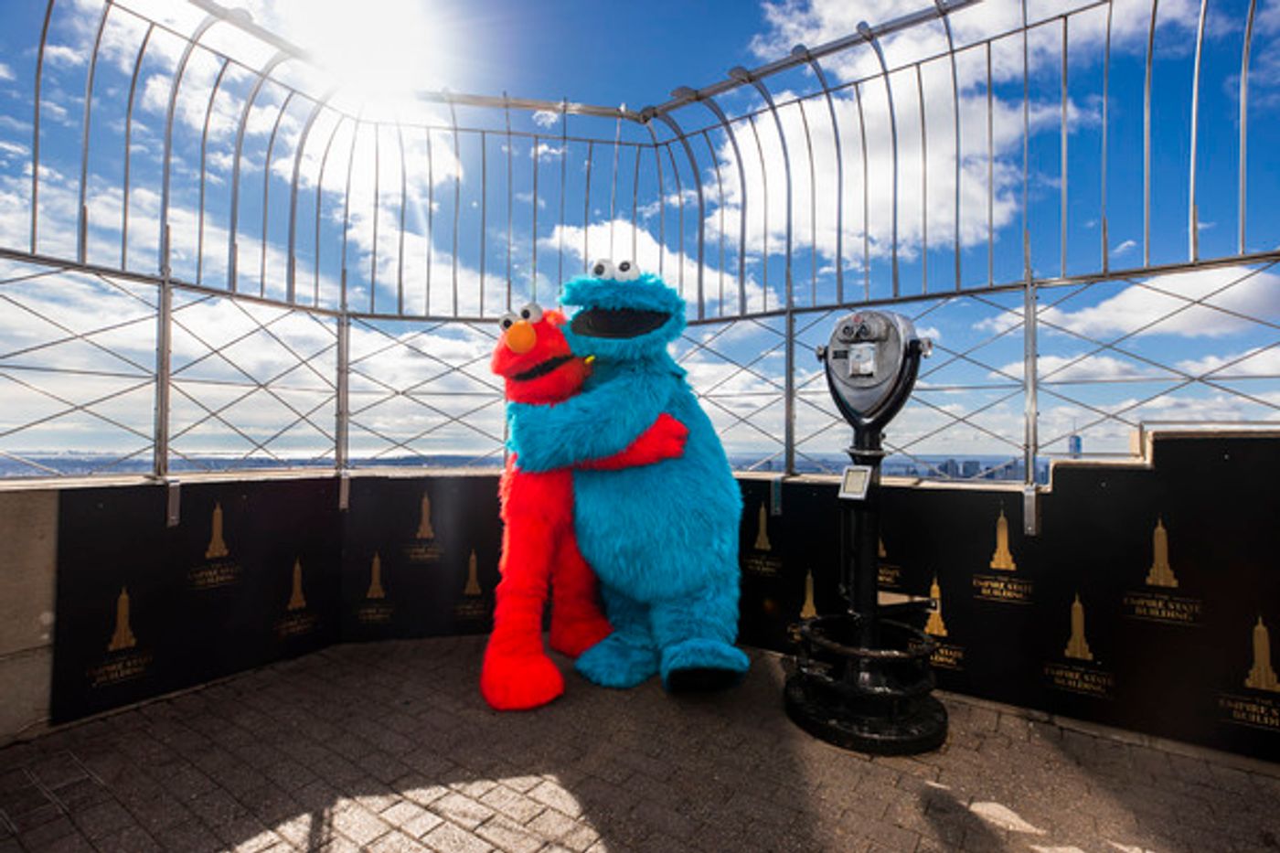 Photos: The Empire State Building Celebrates SESAME STREET LIVE! with Elmo and Cookie Monster Photos: The Empire State Building Celebrates SESAME STREET LIVE! with Elmo and Cookie Monster Image