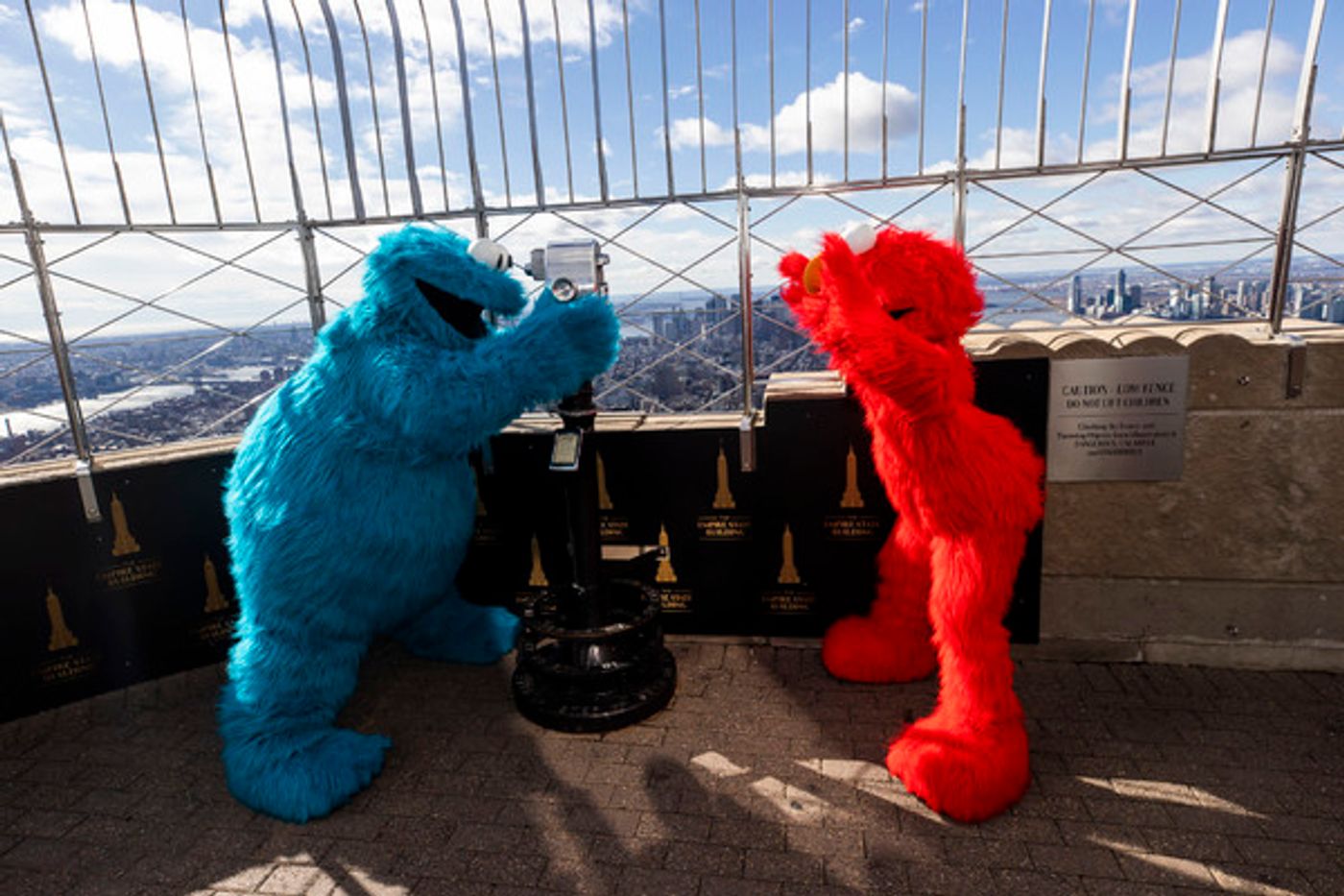 Photos: The Empire State Building Celebrates SESAME STREET LIVE! with Elmo and Cookie Monster Photos: The Empire State Building Celebrates SESAME STREET LIVE! with Elmo and Cookie Monster Image