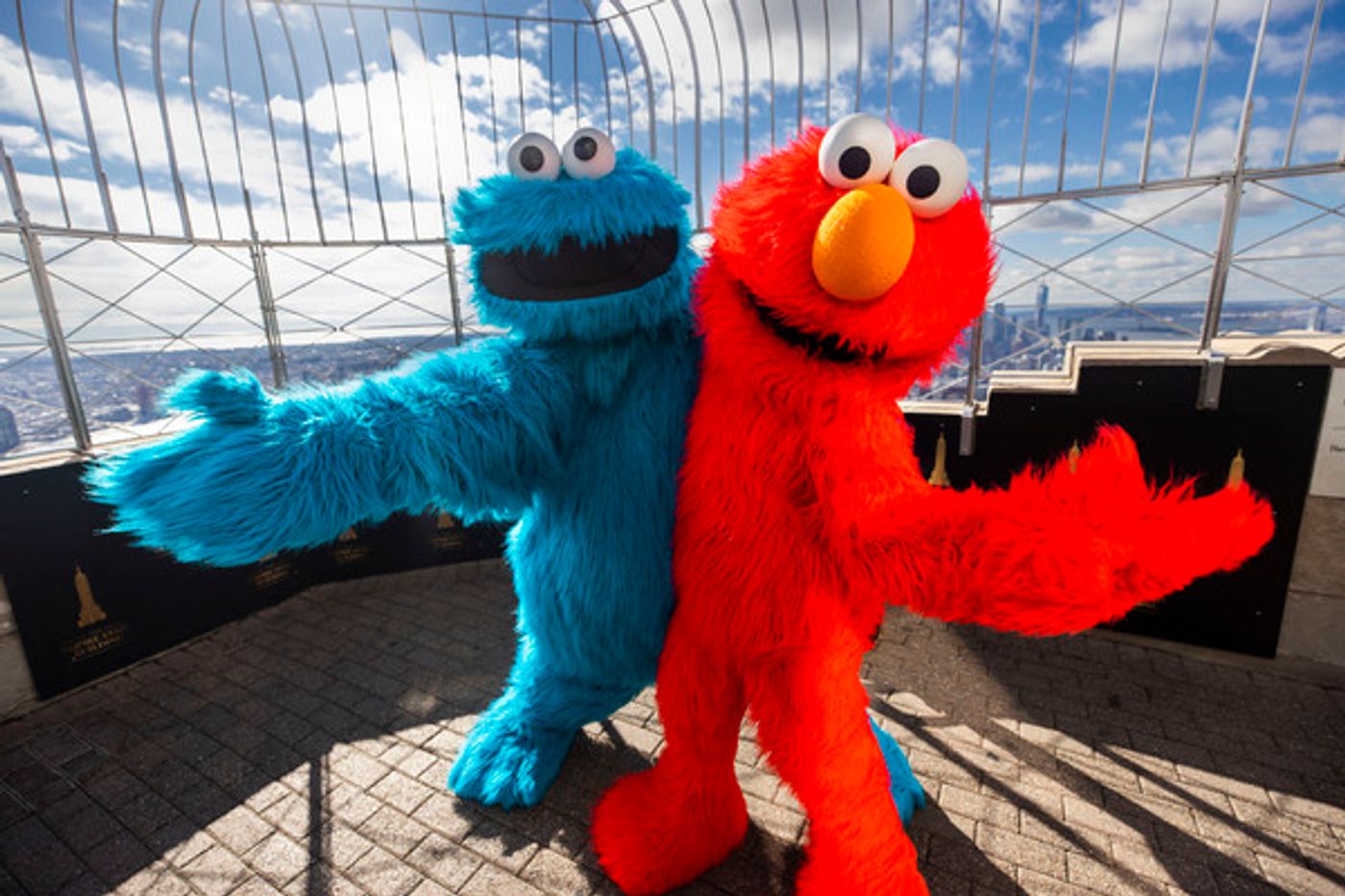 Photos: The Empire State Building Celebrates SESAME STREET LIVE! with Elmo and Cookie Monster Photos: The Empire State Building Celebrates SESAME STREET LIVE! with Elmo and Cookie Monster Image