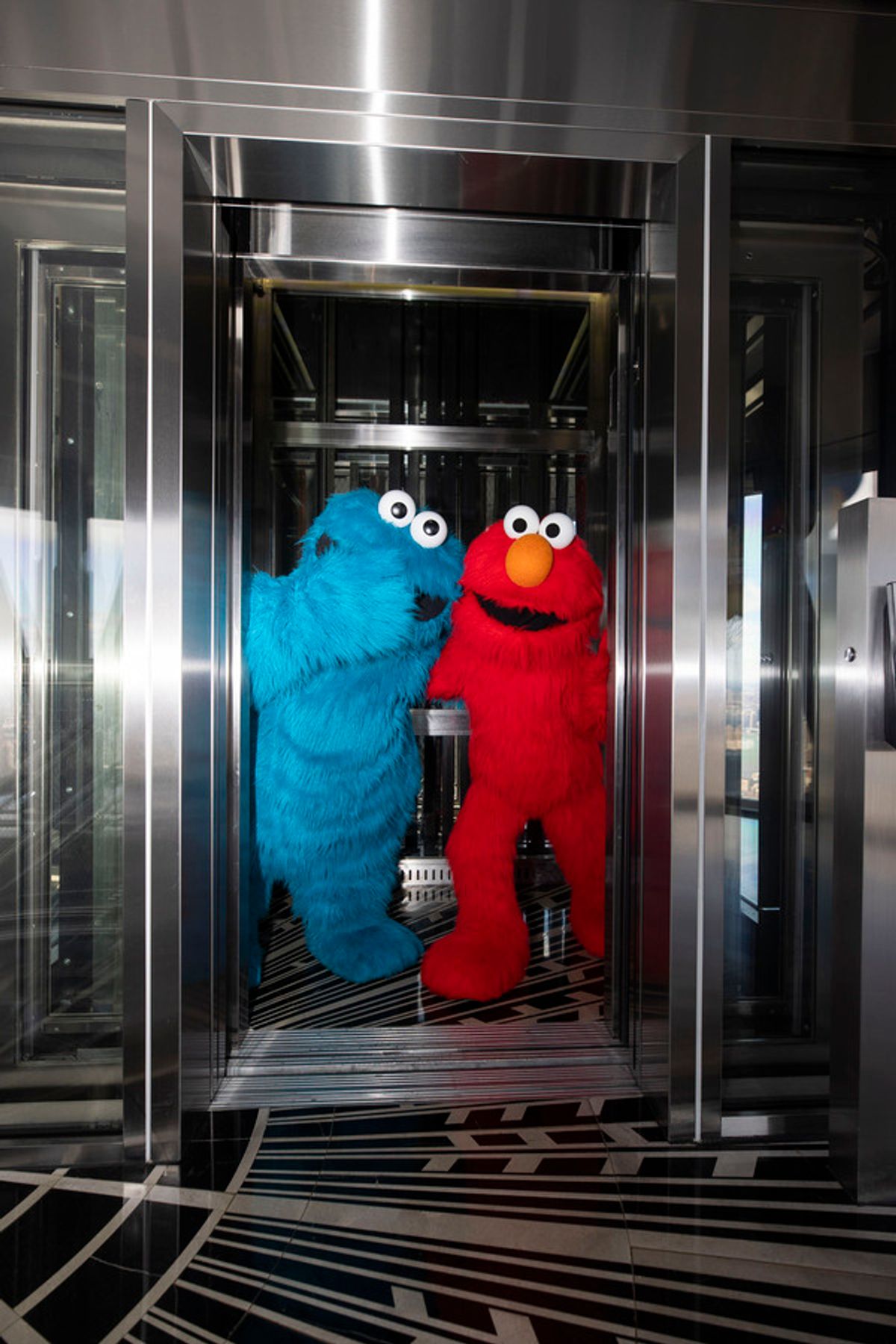 Elmo and Cookie Monster at Photos: The Empire State Building Celebrates SESAME STREET LIVE! with Elmo and Cookie Monster