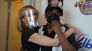 Meredith Thomas and Dale E. Turner   Photo by Headshots by Peggy  Photo