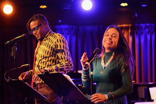 Darrel Alejandro Holnes and Peggy Robles-Alvarado celebrating the launch of Holnes? S Photo