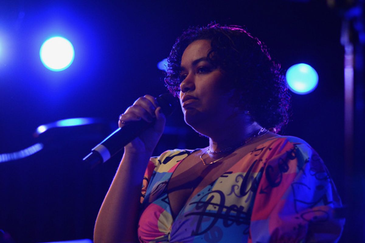 Genesis Adelia Collado, celebrating the launch of Darrel Alejandro Holnes? Stepmotherland at Thomas March?s Poetry/Cabaret, NYC?s ?variety salon?, Feb 25th, at The Green Room 42. at 