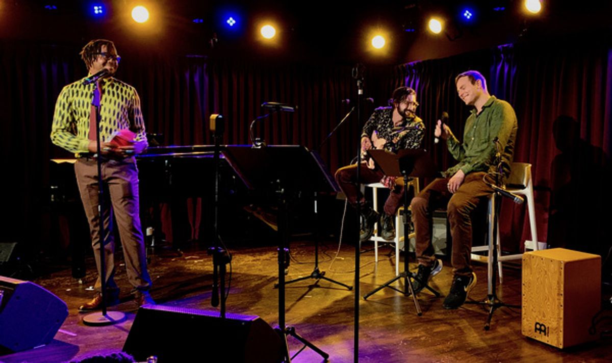 Darrel Alejandro Holnes, Michael Manzi, and Carl Ciaramitaro, celebrating the launch of Holnes? Stepmotherland at Thomas March?s Poetry/Cabaret, NYC?s ?variety salon?, Feb 25th, at The Green Room 42. at 