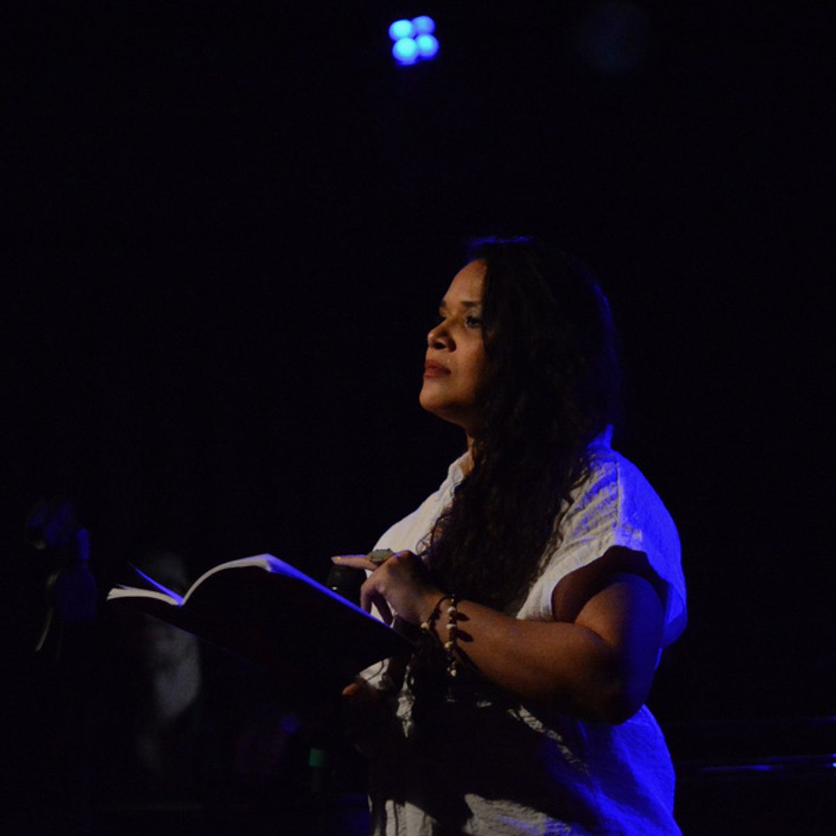 Christin Eve Cato, celebrating the launch of Darrel Alejandro Holnes? Stepmotherland at Thomas March?s Poetry/Cabaret, NYC?s ?variety salon?, Feb 25th, at The Green Room 42. at 