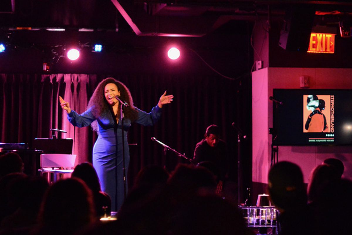 Nicole Vanessa Ortiz, celebrating the launch of Darrel Alejandro Holnes? Stepmotherland at Thomas March?s Poetry/Cabaret, NYC?s ?variety salon?, Feb 25th, at The Green Room 42. at 