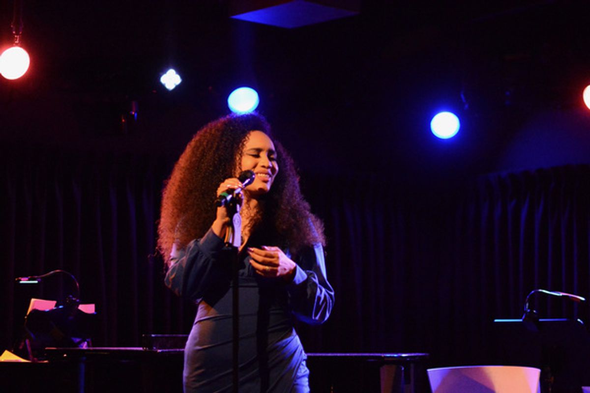 Nicole Vanessa Ortiz, celebrating the launch of Darrel Alejandro Holnes? Stepmotherland at Thomas March?s Poetry/Cabaret, NYC?s ?variety salon?, Feb 25th, at The Green Room 42. at 