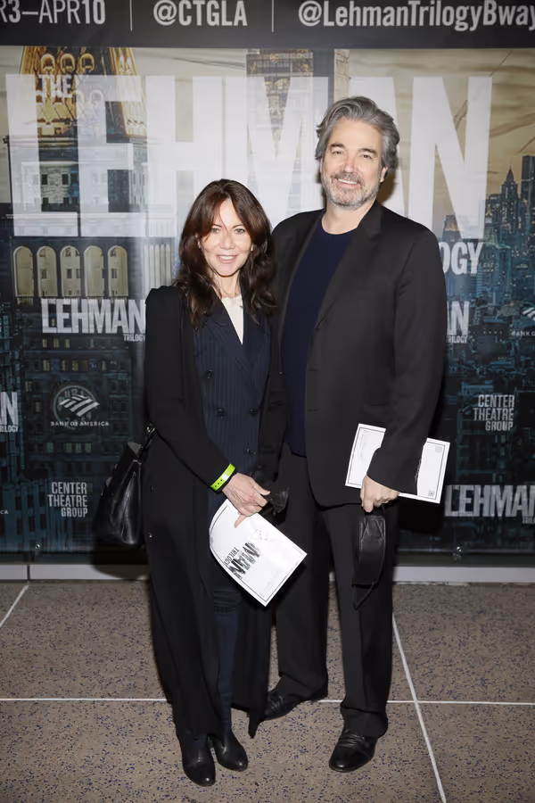 From left, film producer Leslie Urdang and actor Jon Tenney arrive for the opening ni Photo