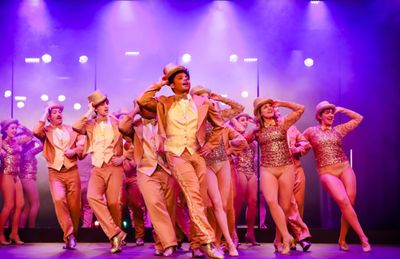Paul (Roycen Daley) and the company Photo