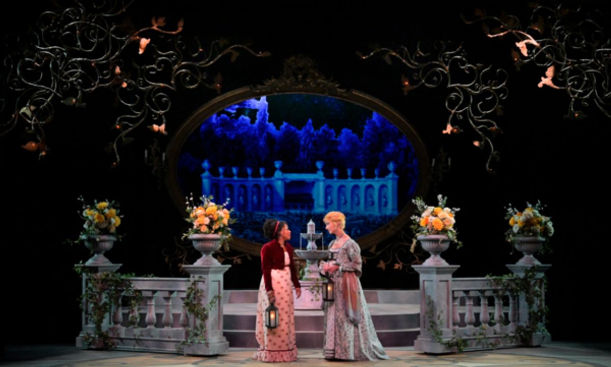 Sisters Marianne (Antoinette Comer) and Elinor (Sharon Rietkerk) confide in each other at 