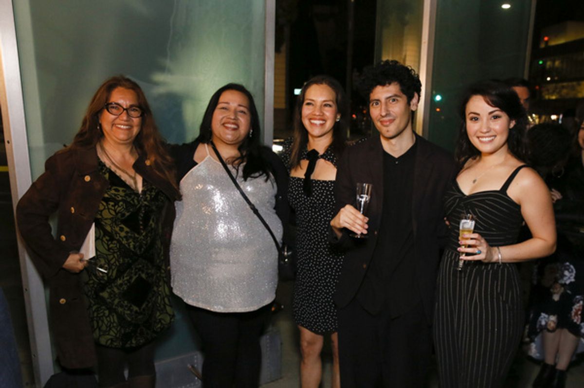 From left, director Juliette Carrillo, assistant director Angela Cruz Martinez, cast member Cheryl Uma a, playwright Benjamin Benne and cast member Sabrina Fest during the champagne toast after the wo at 