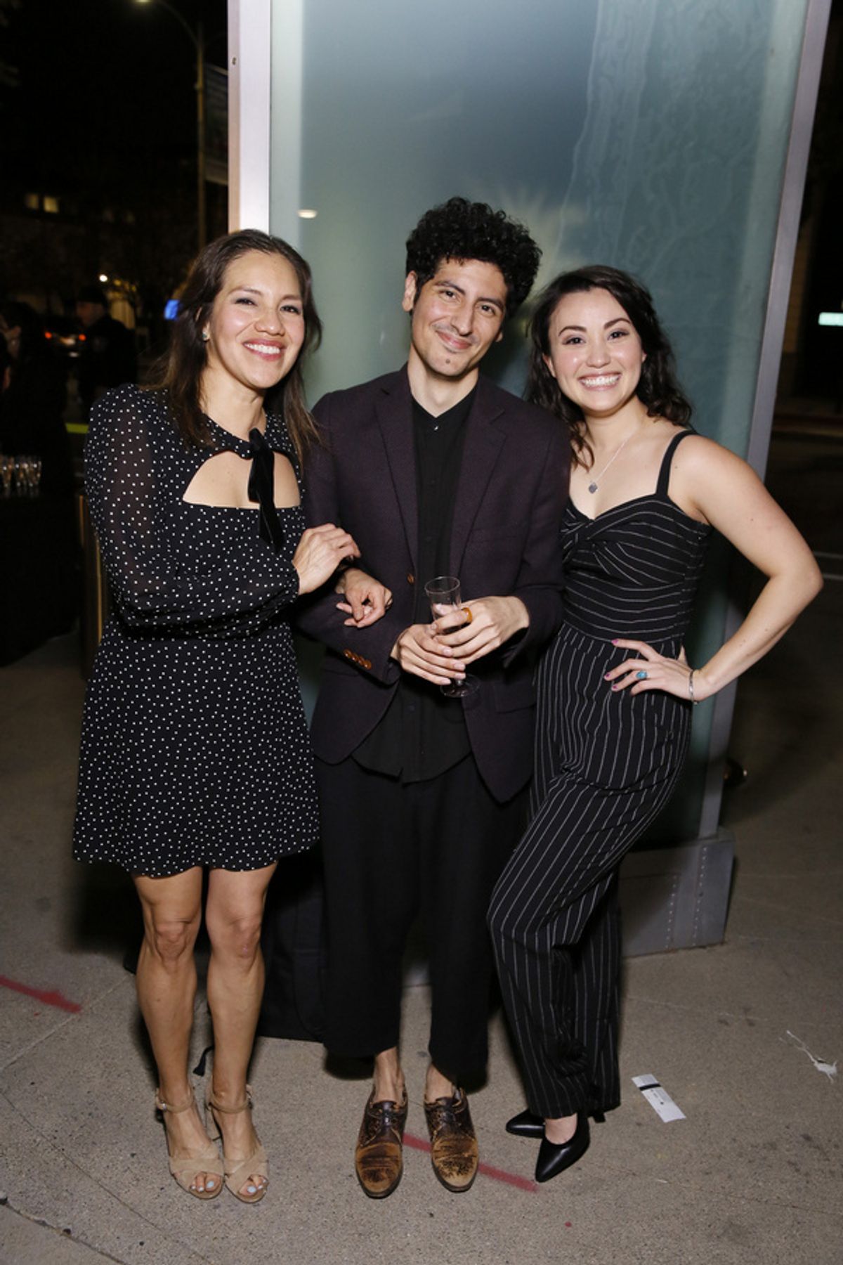 From left, cast member Cheryl Uma a, playwright Benjamin Benne and cast member Sabrina Fest during the champagne toast after the world premiere of ?Alma? at Center Theatre Group?s Kirk Douglas Theatre at 