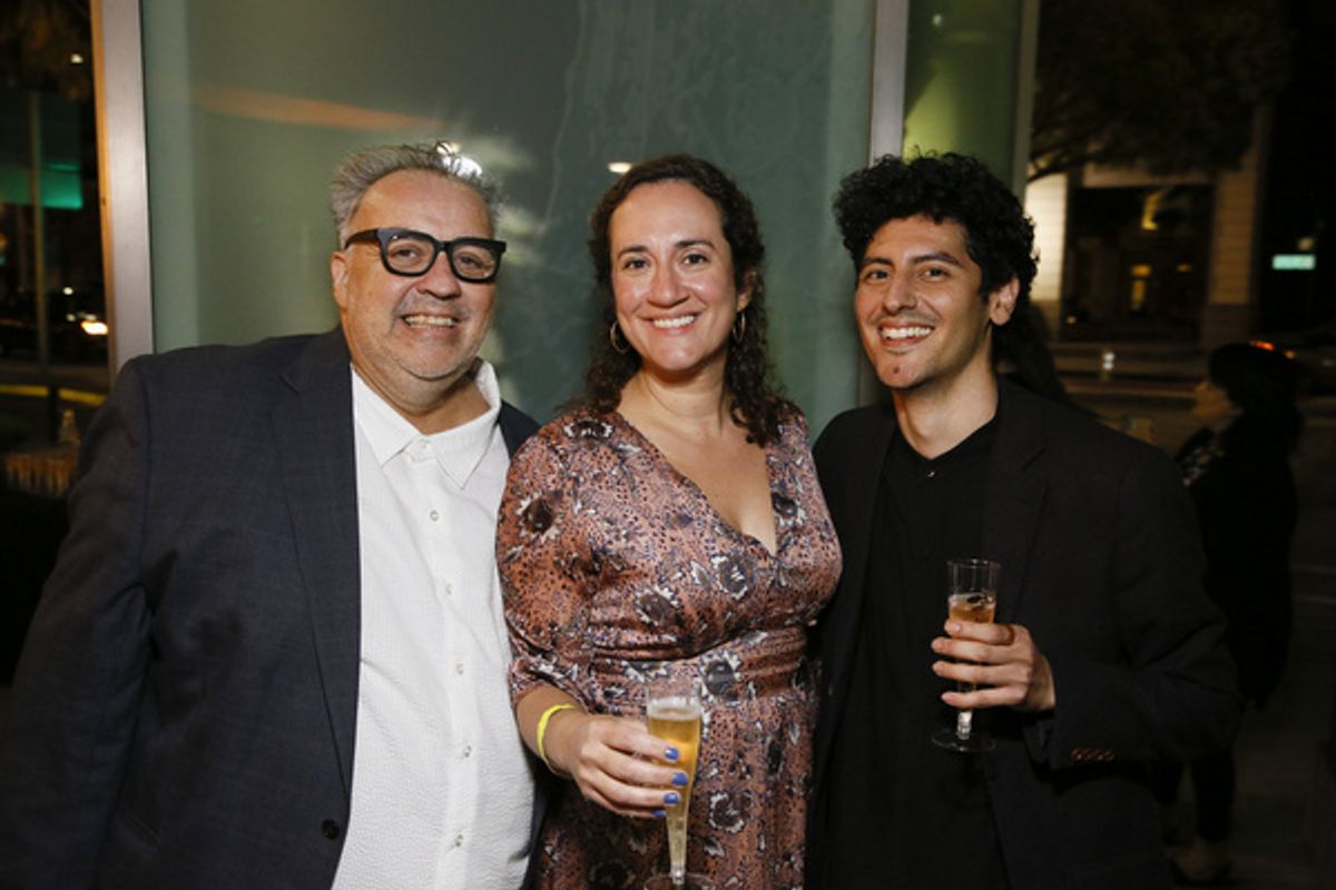 From left, Center Theatre Group Associate Artistic Director Luis Alfaro, Center Theatre Group Managing Director/CEO Meghan Pressman and playwright Benjamin Benne during the champagne toast after the w at 