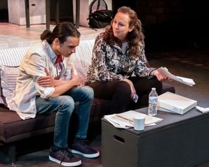 Editor Emily (Krista Schafer Ewbank) lands a point against the fact checker (David Li Photo