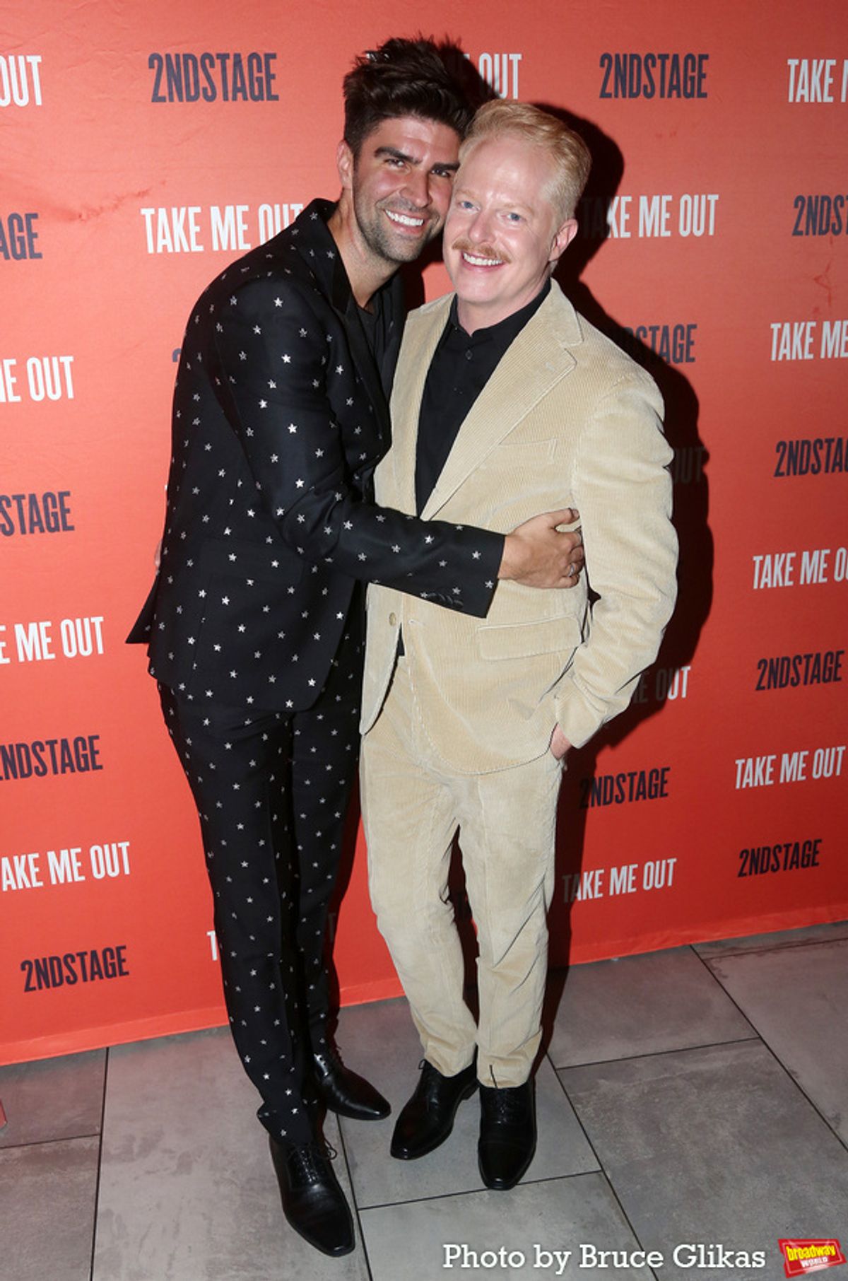Justin Mikita and Jesse Tyler Ferguson at 