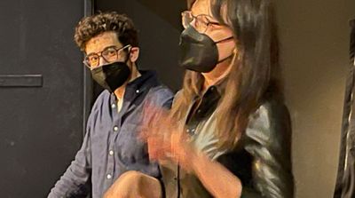 Director Noah Himmelstein listens as projection designer Caite Hevner shares her visi Photo