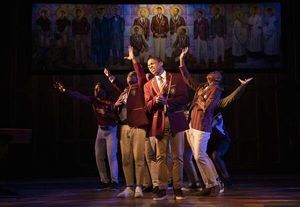 Aaron James McKenzie with members of the cast  Photo