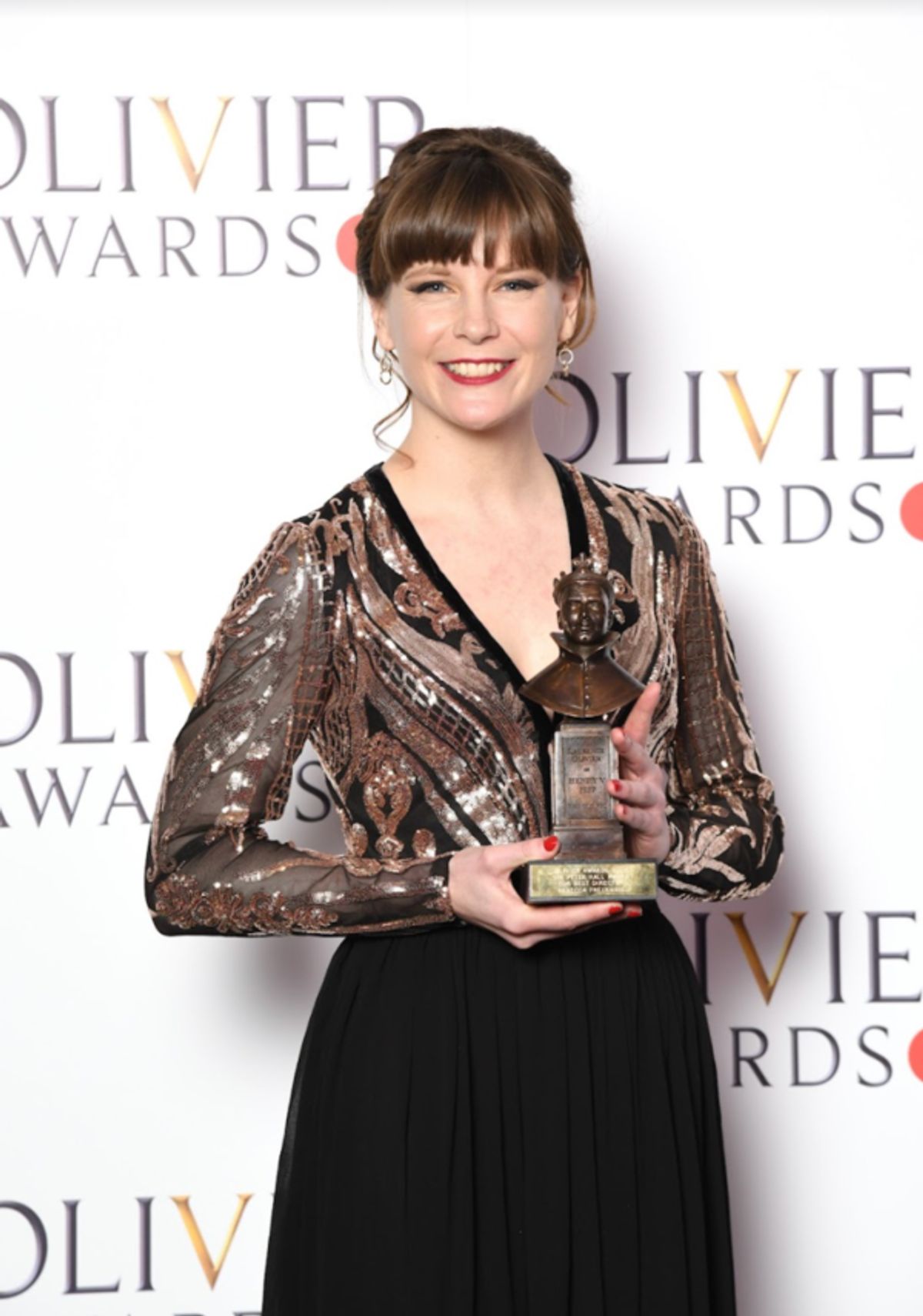 Rebecca Frecknall, winner of the Sir Peter Hall Award for Best Director on the Green Carpet. 
Photo Credits: Gareth Cattermole for Getty.  at 