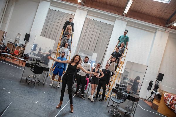 Debbie Kurup (center) and the company in rehearsals.  Photo