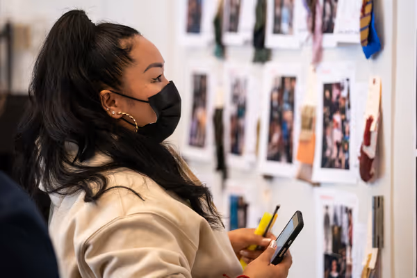 Sara Porkalob views costume designs by Emilio Sosa for 1776 Photo