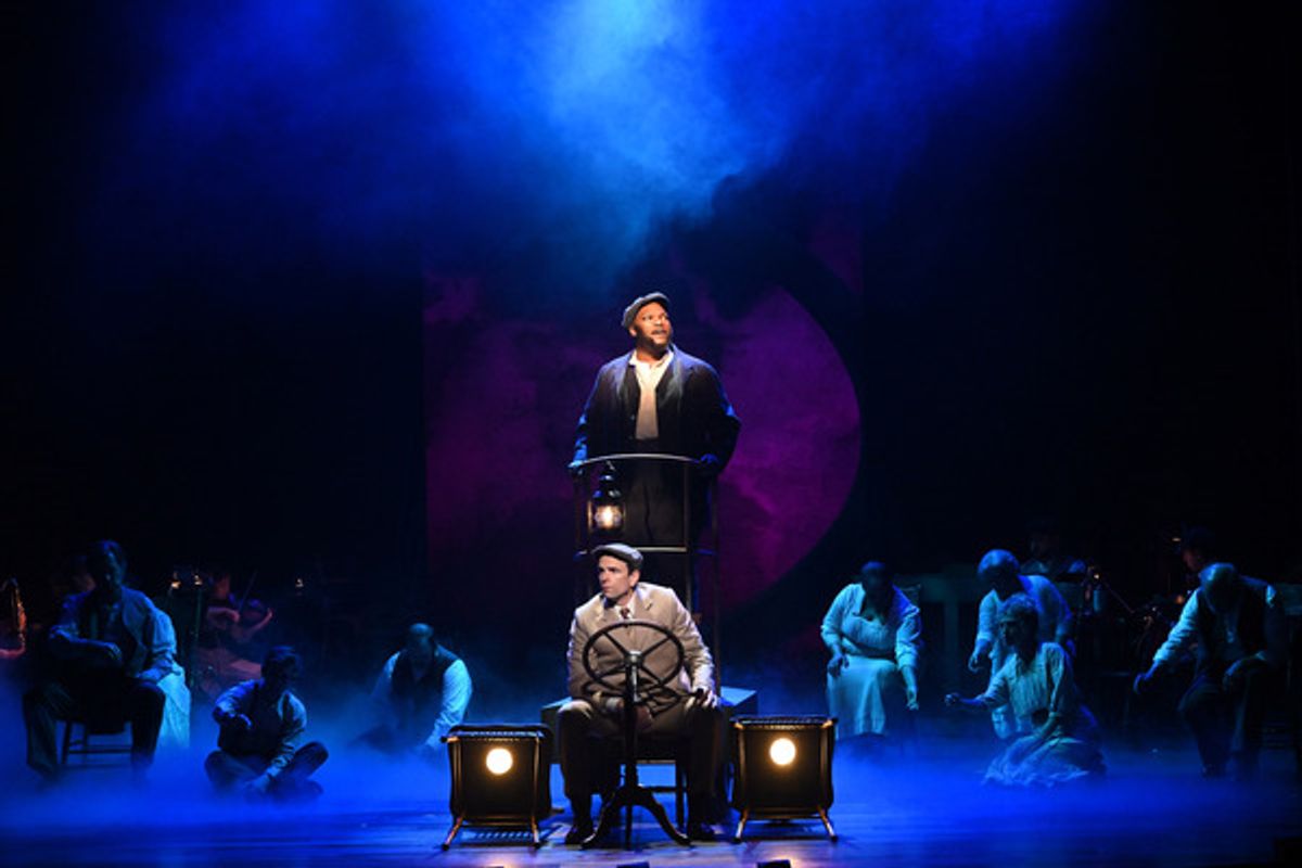 Dwelvan David (back), Paul Alexander Nolan (front) and the cast at 