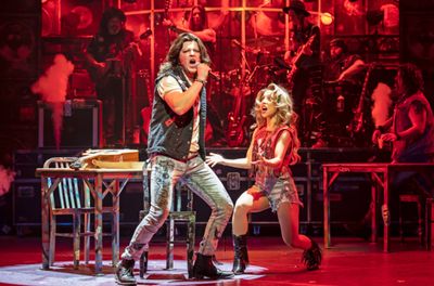 Kieran McCabe (left) plays Drew and Taylor DiTola is Sherrie in Rock of Ages Photo