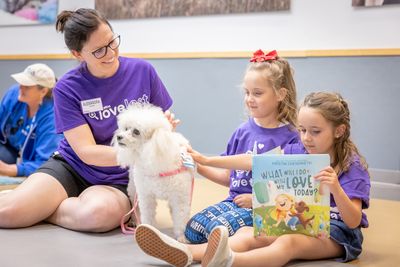 Celebrating National Kids and Pets Day Photo