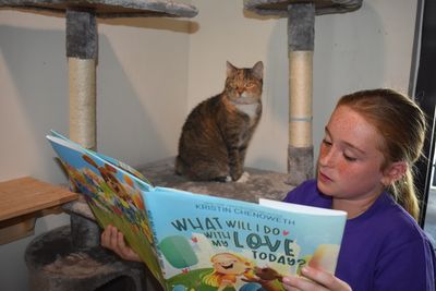 Celebrating National Kids and Pets Day Photo