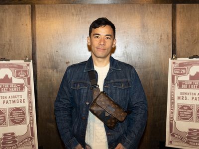 Conrad Ricamora Photo