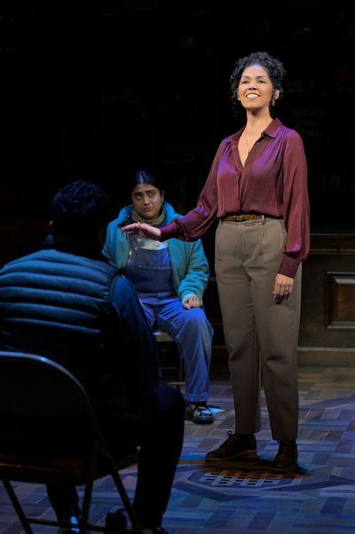 Isabel Santiago, (seated) Kuhoo Verma and J.D. Mollison  Photo