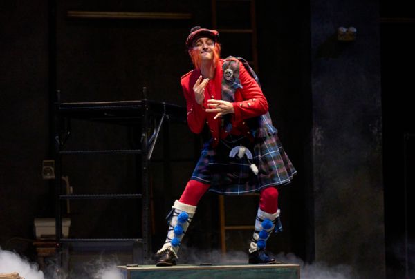 The innkeeper (actor, Joe Wegner*) entertains his guests in the Great Lakes Theater p Photo