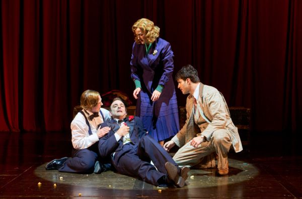 Mr. Memory (actor, Joe Wegner*) gives one last performance as the others (actors L-R, Photo