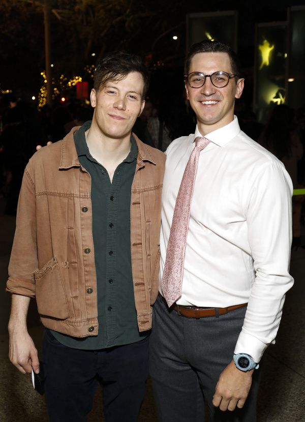 From left, cast members Alexander Neher and Tim Kopacz during the champagne toast on  Photo