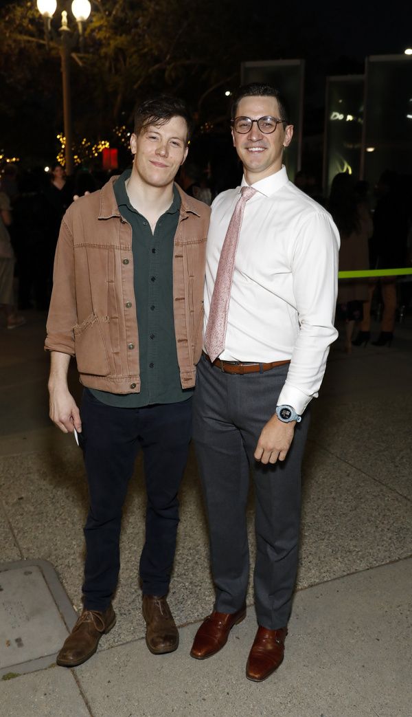 From left, cast members Alexander Neher and Tim Kopacz during the champagne toast on  Photo