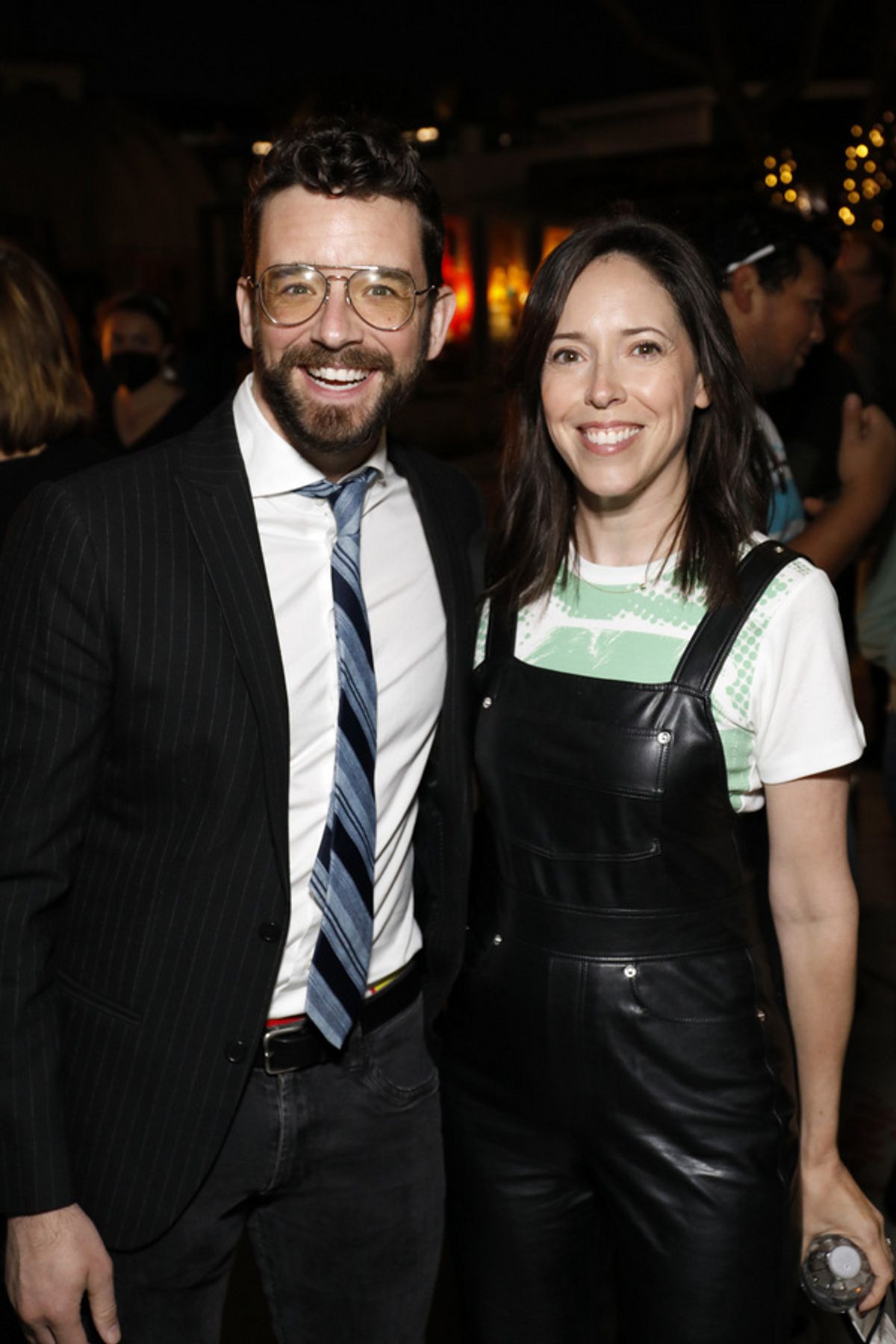 From left, actor Michael Urie and Center Theatre Group Associate Artistic Director Lindsay Allbaugh during the champagne toast on opening night of the World premiere production of ?Tambo & Bones? at C at 