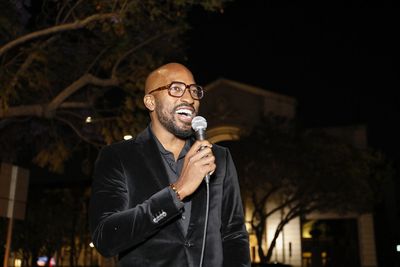 Playwright Dave Harris gives a toast on opening night of the World premiere productio Photo
