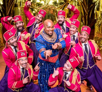 Michael James Scott as the Genie and the Ensemble of Aladdin's North American Tour. P Photo