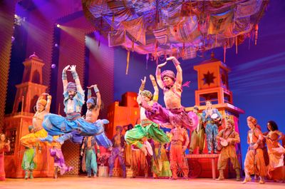 The cast of the North American touring production of Disney's Aladdin performing "Ara Photo