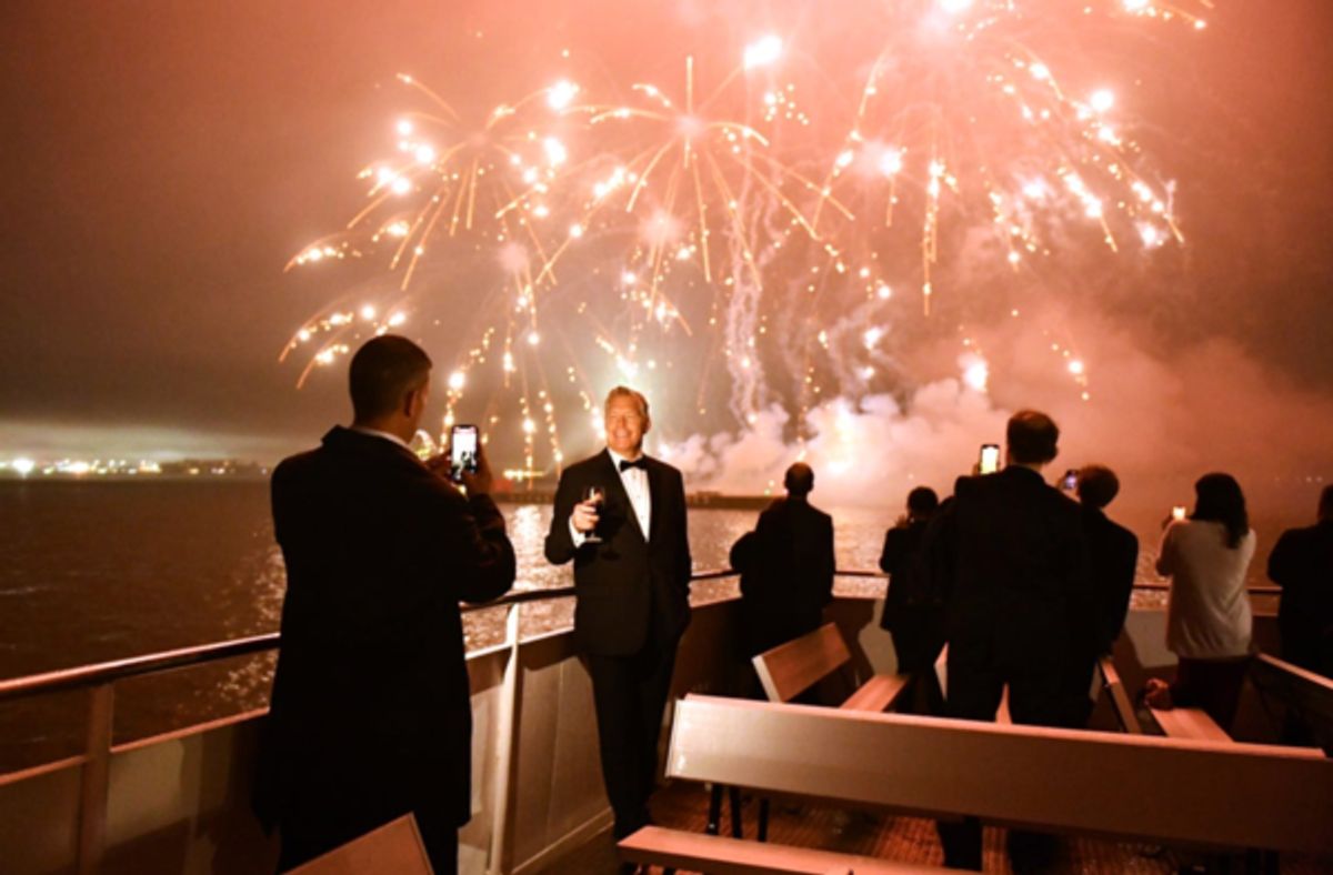 Guests view fireworks show at the 35th Anniversary Ellis Island Medals of Honor at Ellis Island on May 14, 2022 in New York City. (Photo by Noam Galai/Getty Images for Ellis Island Honors Society) at 