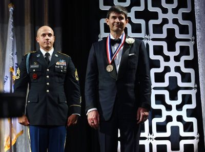 Lawrence O'Connor (R) is honored at the 35th Anniversary Ellis Island Medals of Honor Photo