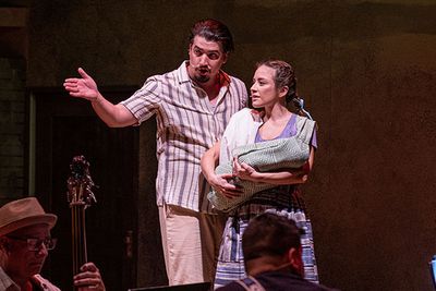 Andrés Enriquez (left) plays Don Napoleon and Gabriela Moscoso is Reina  Photo