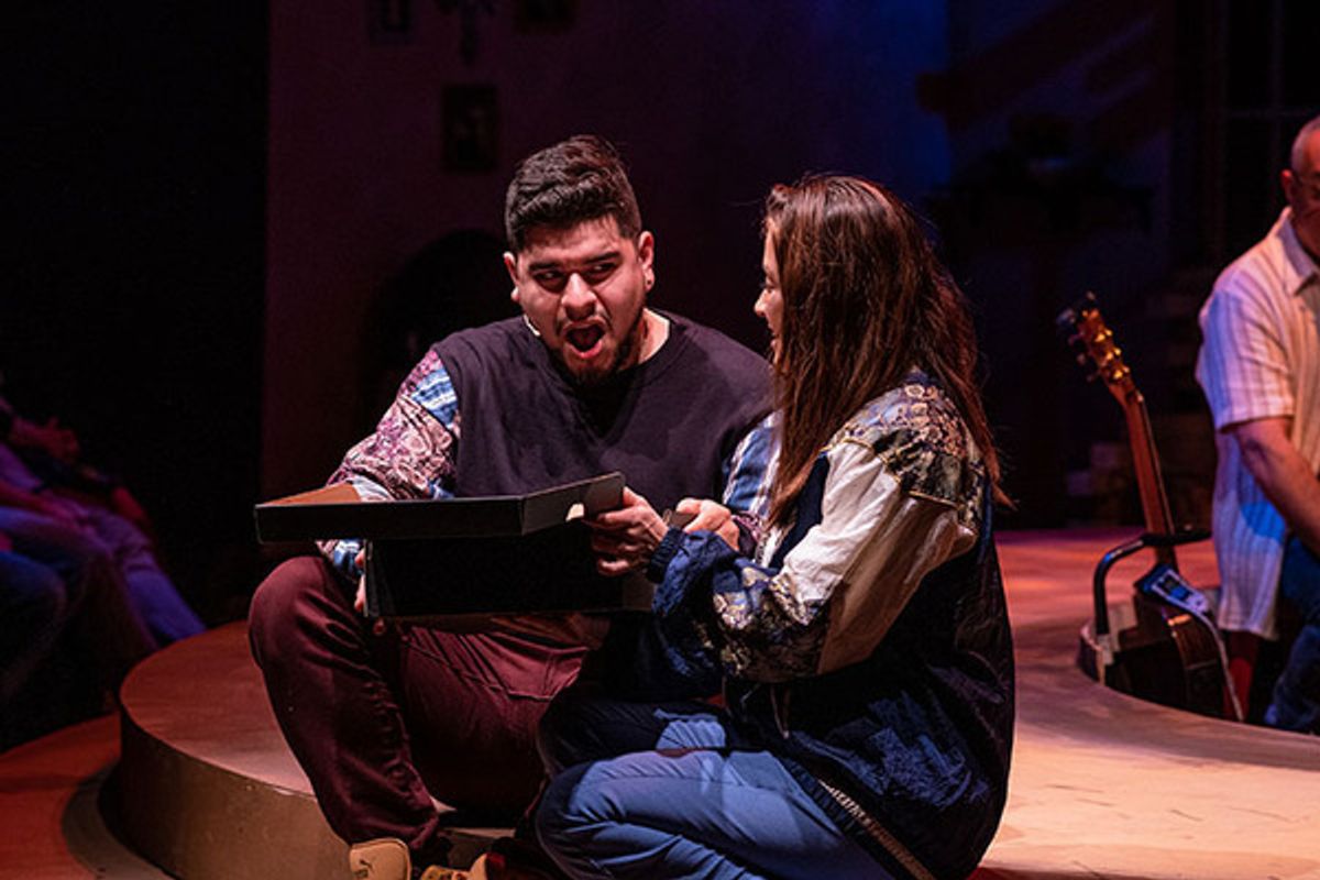 Brian Quijada (left) is the playwright and narrator and Gabriela Moscoso is Reina at 